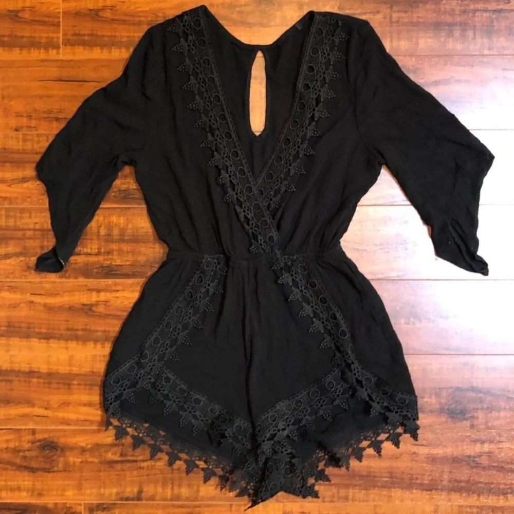 Unknown black embroidered